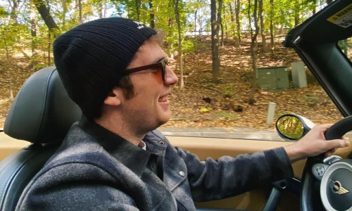 a man driving a vehicle